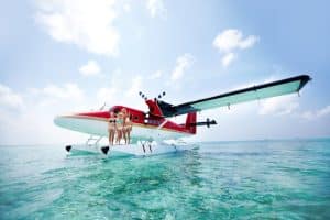 seaplane with three females on float