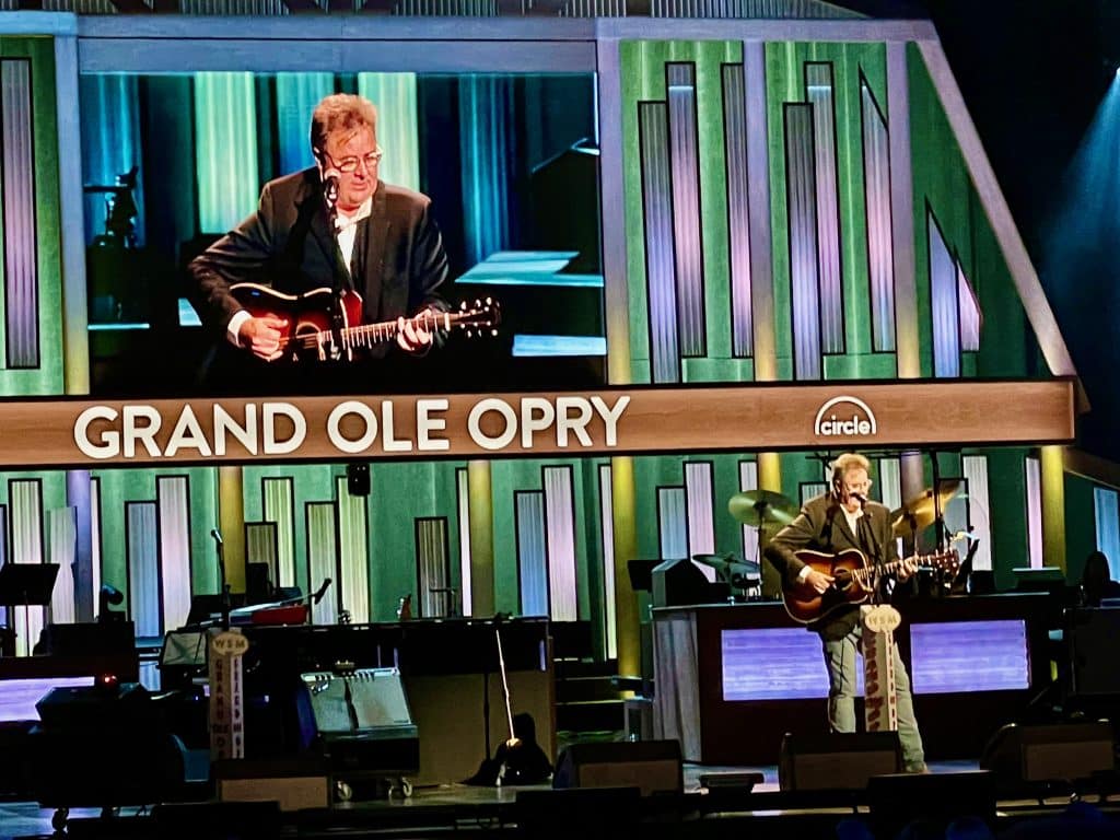 stage of the grand ole opry with Vince Gill