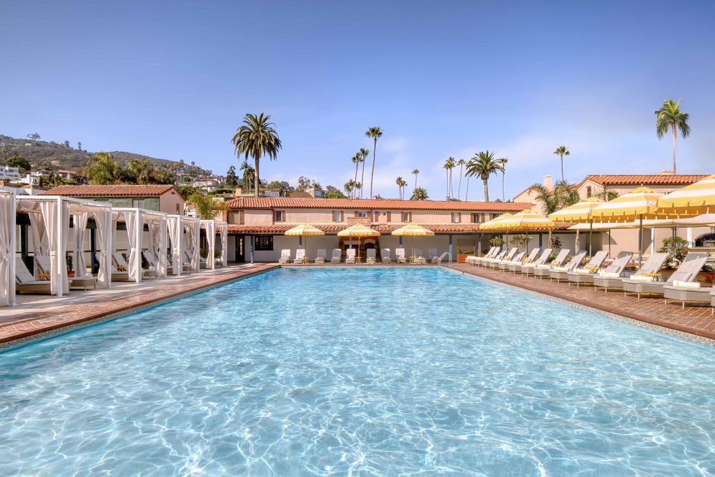 pool with lounge chair around it
