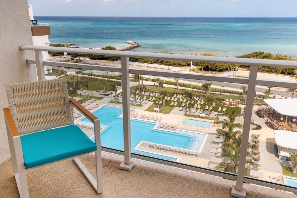 balcony view of pool and ocean