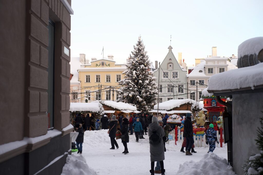 snow piled on xmas market