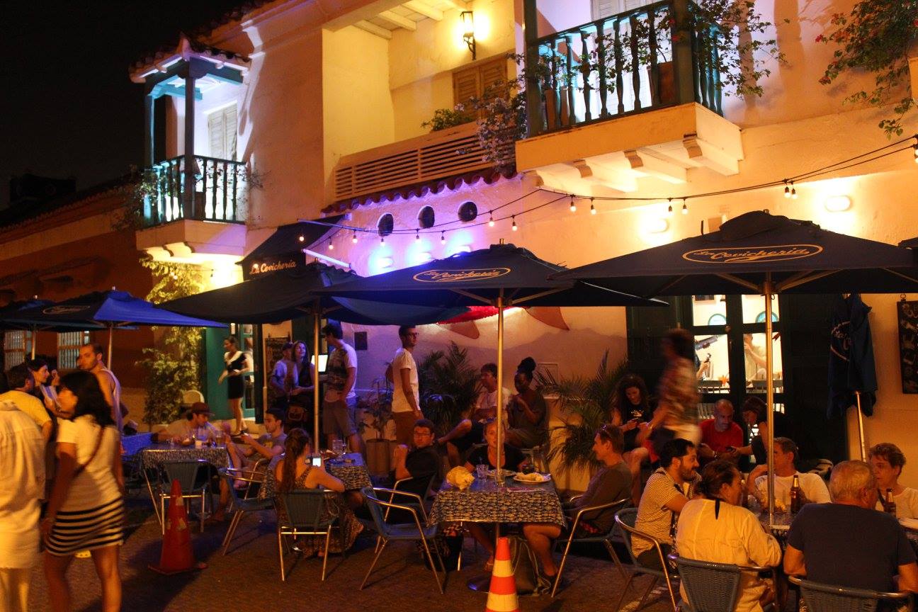 People dining outside a restaurant - Things to do in Cartagena.