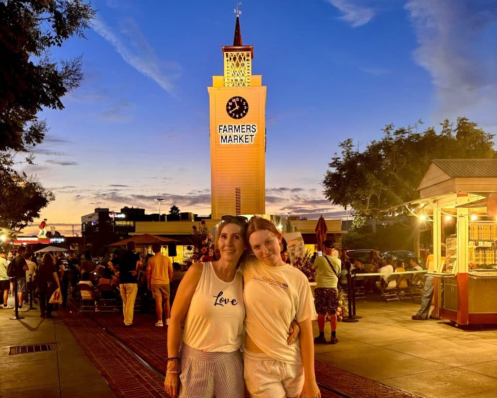 Mom and daughter hanging at the Farmers Market.
