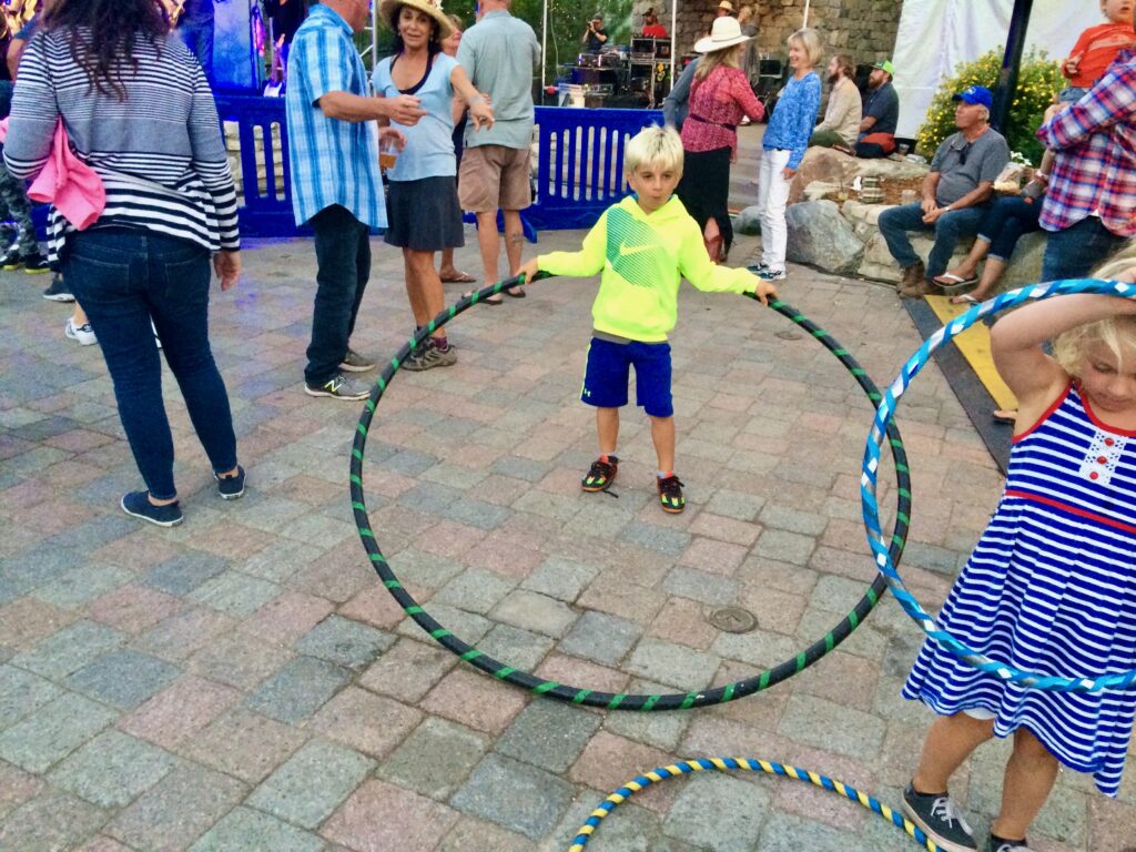 small boy with giant hoop