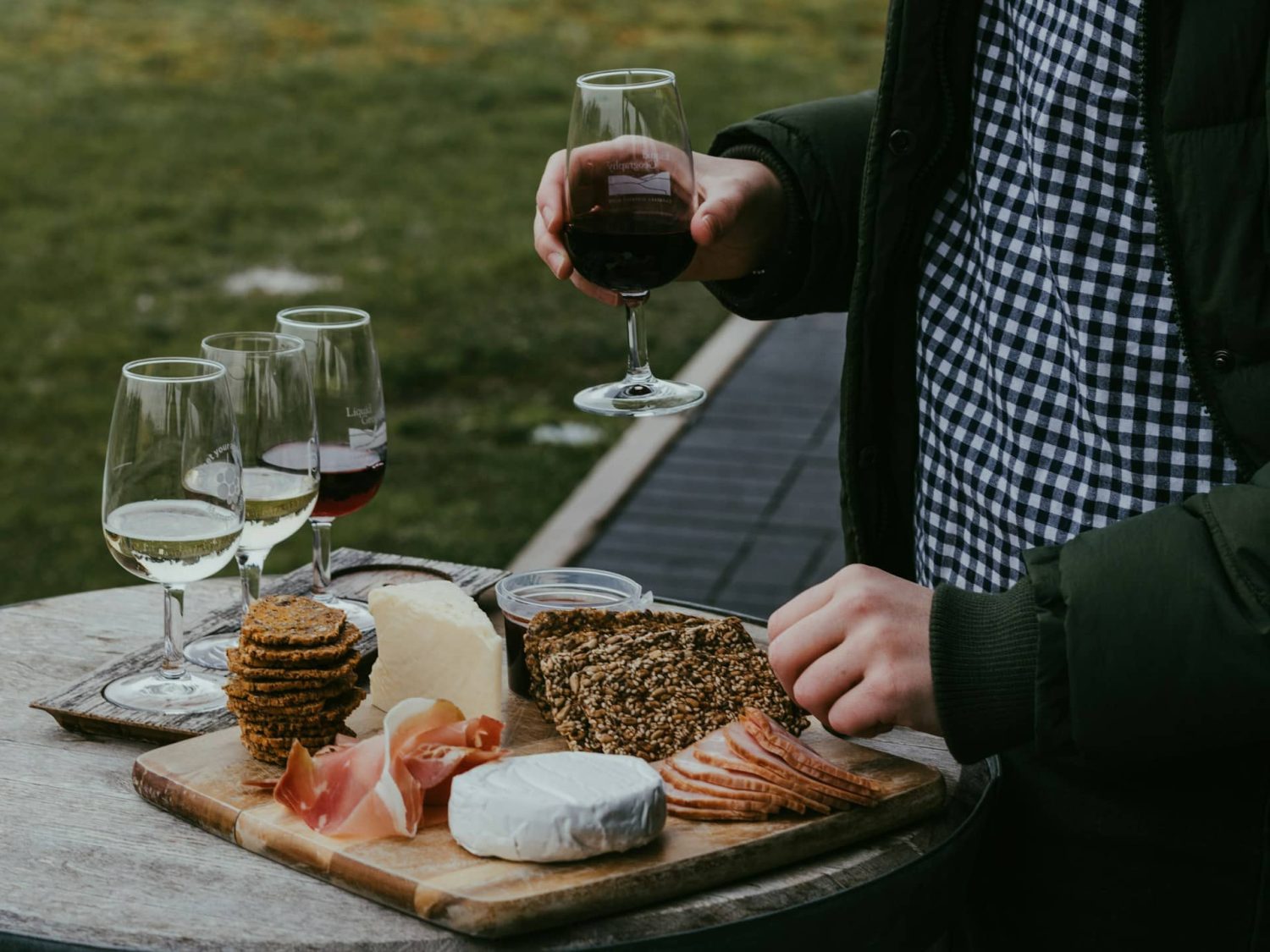 Wine tasting samples with charcuterie board. California wine festivals. 