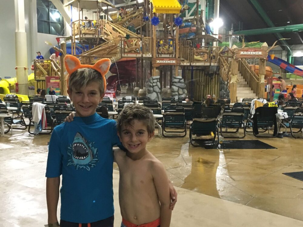 two boys standing inside great wolf lodge anaheim