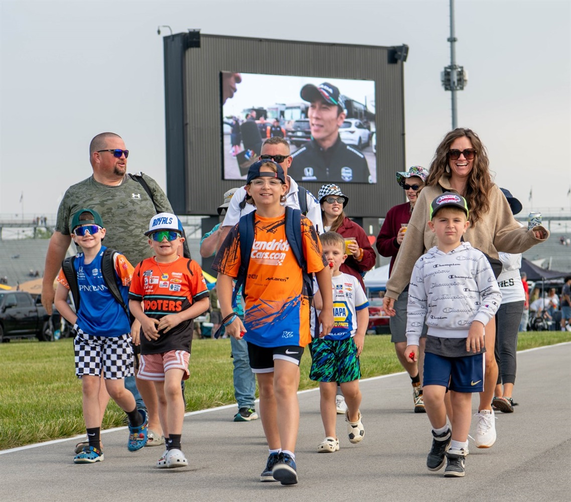 Family visiting the Indianapolis Motor Speedway on Race Day!