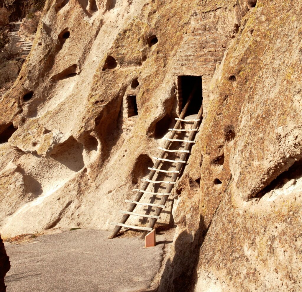 Wooden ladder to a cave opening. 