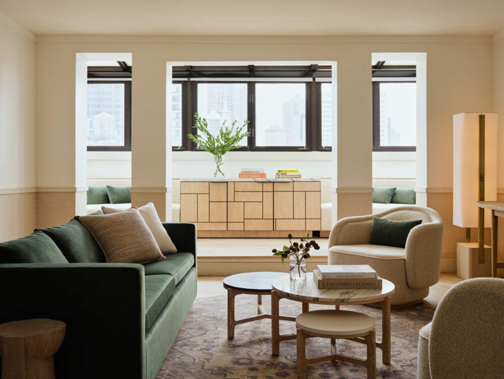 modern and comfortable looking hotel room in creams