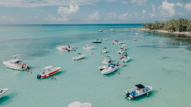 boats on baby blue water cayman islands