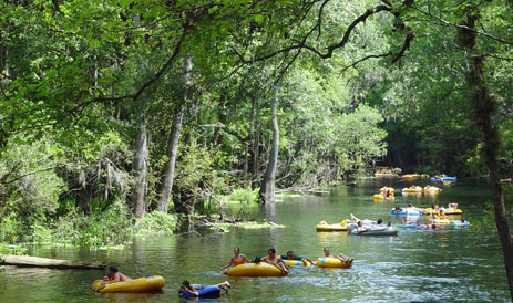 Inchetucknee Springs State Park, people floating down the spring. Hot springs in Florida. Best natural springs. 