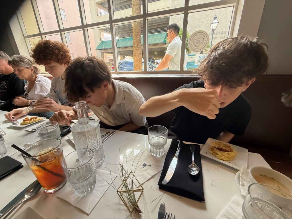 boys eating soup