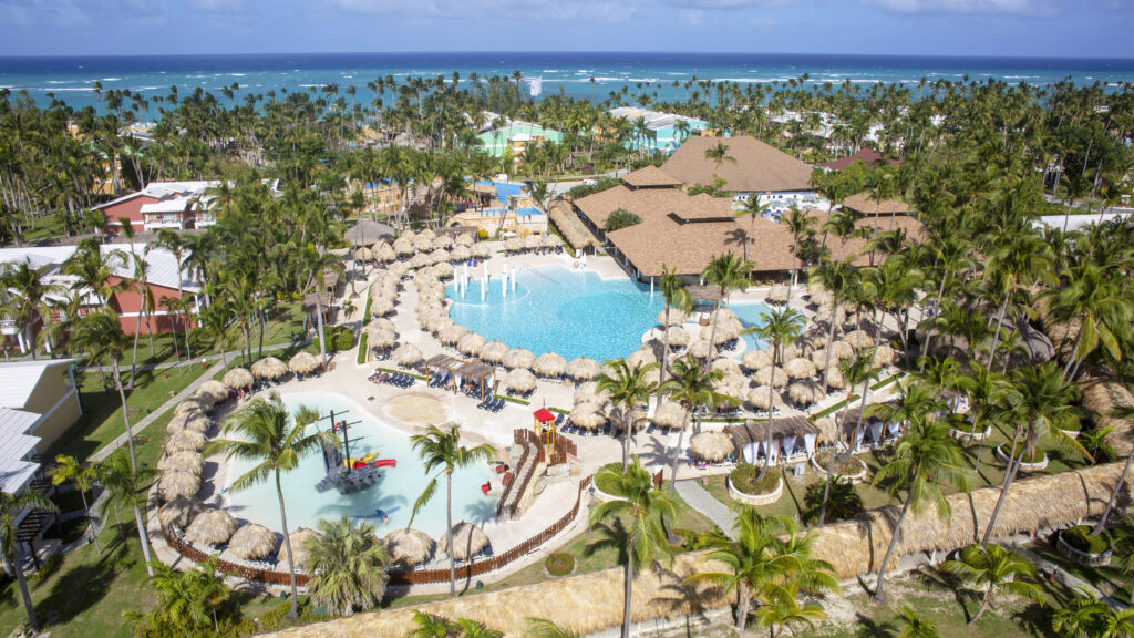 aerial of Grand Palladium pools, tropical landscape and ocean