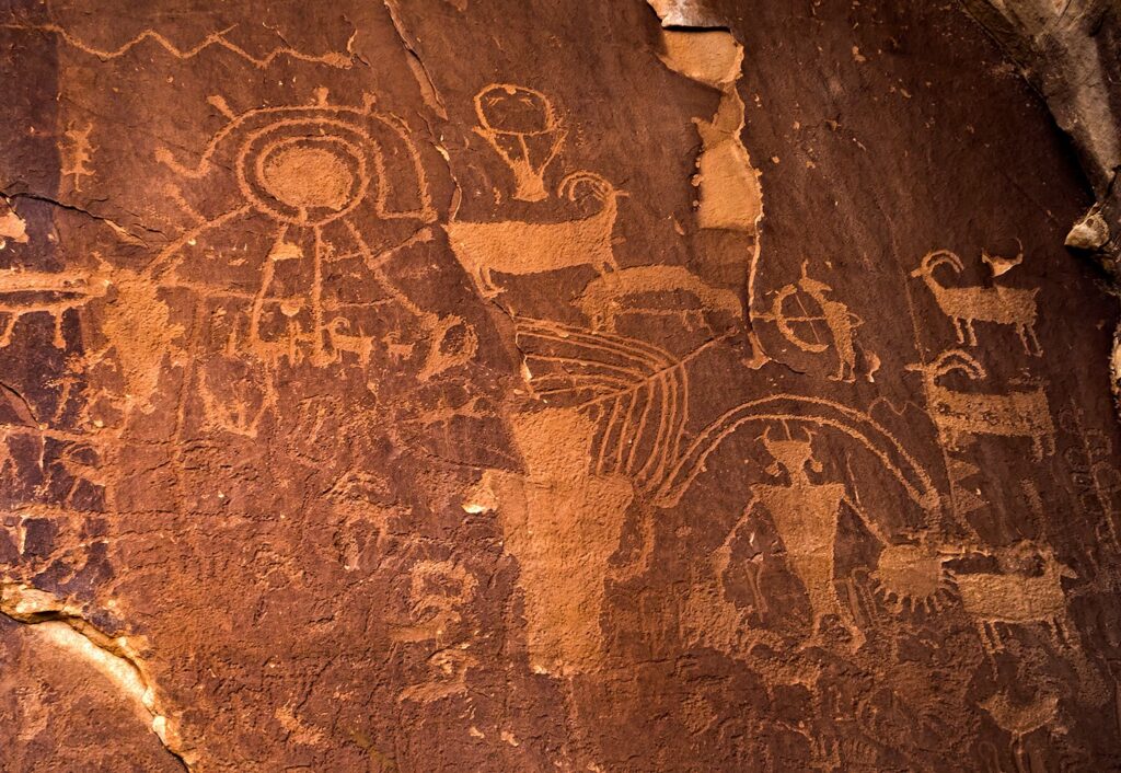petroglyphs on red rock.